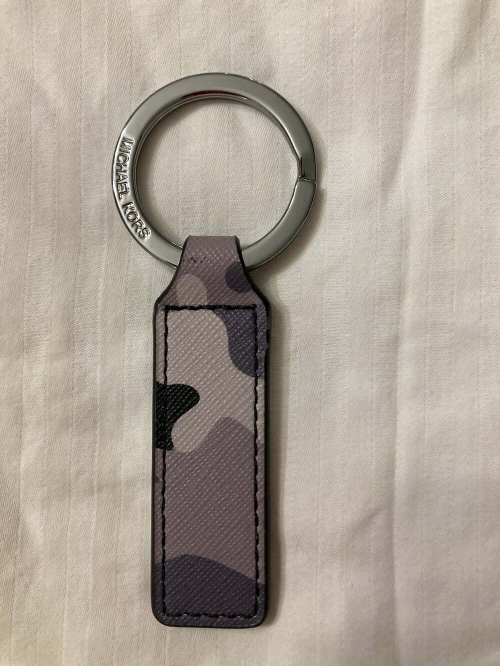 MICHAEL KORS GRAY, TAN, BLACK CAMO KEY CHAIN